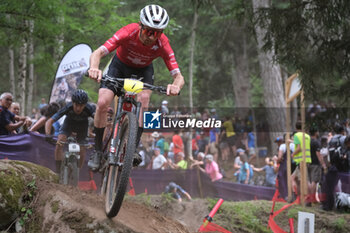 2023-07-02 - Mathias Fluckiger (SUI) in action during XCO Elite Men race, at UCI MTB World Series 2023, Val di Sole stage on July 02, 2023 in Val di Sole, Trento, Italy. - UCI MTB WORLD CUP - XCO ELITE MEN RACE - MTB - MOUNTAIN BIKE - CYCLING