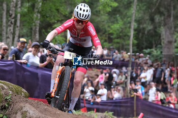 2023-07-02 - Puck Pieterse (NED) in action during XCO Elite Women race, at UCI MTB World Series 2023, Val di Sole stage on July 02, 2023 in Val di Sole, Trento, Italy. - UCI MTB WORLD CUP - XCO ELITE WOMEN RACE - MTB - MOUNTAIN BIKE - CYCLING