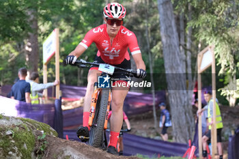2023-07-02 - Ronja Blochlinger (SUI) in action during XCO U23 Women race, at UCI MTB World Series 2023, Val di Sole stage on July 02, 2023 in Val di Sole, Trento, Italy. - UCI MTB WORLD CUP - XCO U23 WOMEN RACE - MTB - MOUNTAIN BIKE - CYCLING