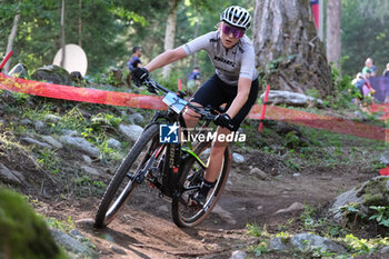 2023-07-02 - Noelle Buri (SUI) in action during XCO U23 Women race, at UCI MTB World Series 2023, Val di Sole stage on July 02, 2023 in Val di Sole, Trento, Italy. - UCI MTB WORLD CUP - XCO U23 WOMEN RACE - MTB - MOUNTAIN BIKE - CYCLING