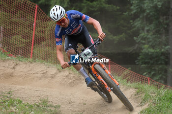 2023-07-02 - Jente Michels (BEL) in action during XCO U23 Men race, at UCI MTB World Series 2023, Val di Sole stage on July 02, 2023 in Val di Sole, Trento, Italy. - UCI MTB WORLD CUP - XCO U23 MEN RACE - MTB - MOUNTAIN BIKE - CYCLING