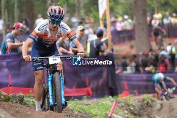 2023-07-02 - Andreas Emanuele Vittone engaged in a single track during XCO U23 Men race, at UCI MTB World Series 2023, Val di Sole stage on July 02, 2023 in Val di Sole, Trento, Italy. - UCI MTB WORLD CUP - XCO U23 MEN RACE - MTB - MOUNTAIN BIKE - CYCLING