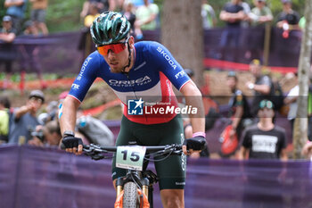2023-07-02 - Luca Martin (FRA) in action during XCO U23 Men race, at UCI MTB World Series 2023, Val di Sole stage on July 02, 2023 in Val di Sole, Trento, Italy. - UCI MTB WORLD CUP - XCO U23 MEN RACE - MTB - MOUNTAIN BIKE - CYCLING