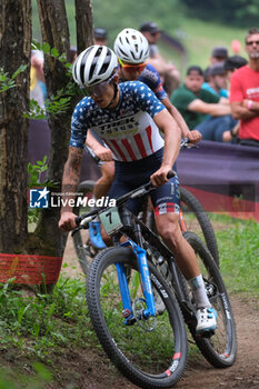 2023-07-02 - Bjorn Riley (USA) in action during XCO U23 Men race, at UCI MTB World Series 2023, Val di Sole stage on July 02, 2023 in Val di Sole, Trento, Italy. - UCI MTB WORLD CUP - XCO U23 MEN RACE - MTB - MOUNTAIN BIKE - CYCLING