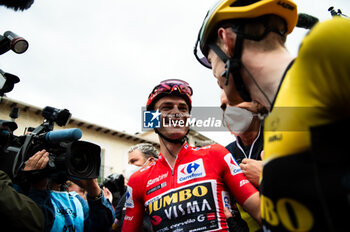 2023-09-16 - Sepp Kuss (Jumbo-Visma), red jersey and winner of the Vuelta Espana 2023, receives compliments from Jonas Vingegaard (Jumbo-Visma) at the end of the stage 20 of the Spanish bicycle race La Vuelta on September 16, 2023 in Guadarrama, Spain - LA VUELTA - STAGE 20 - MANZANARES EL REAL - GUADARRAMA - SPANISH LA VUELTA - CYCLING