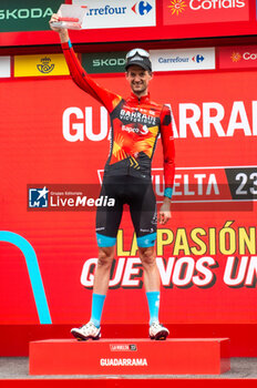 2023-09-16 - Wout Poels (Bahrain Victorious) celebrates on the podium the victory of the stage 20 of the Spanish bicycle race La Vuelta on September 16, 2023 in Guadarrama, Spain - LA VUELTA - STAGE 20 - MANZANARES EL REAL - GUADARRAMA - SPANISH LA VUELTA - CYCLING