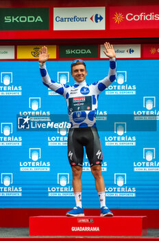 16/09/2023 - Remco Evenepoel (Soudal Quick-Step), climber jersey of the Vuelta Espana 2023, celebrates on the podium at the end of the stage 20 of the Spanish bicycle race La Vuelta on September 16, 2023 in Guadarrama, Spain - LA VUELTA - STAGE 20 - MANZANARES EL REAL - GUADARRAMA - SPANISH LA VUELTA - CICLISMO