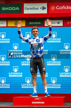 2023-09-16 - Remco Evenepoel (Soudal Quick-Step), climber jersey of the Vuelta Espana 2023, celebrates on the podium at the end of the stage 20 of the Spanish bicycle race La Vuelta on September 16, 2023 in Guadarrama, Spain - LA VUELTA - STAGE 20 - MANZANARES EL REAL - GUADARRAMA - SPANISH LA VUELTA - CYCLING