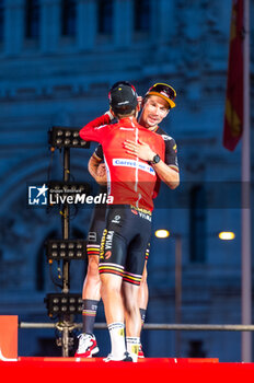 2023-09-17 - Primoz Roglic (Jumbo-Visma) and Sepp Kuss (Jumbo-Visma) at the final awards ceremony of the Spanish cycling race La Vuelta at Plaza de Cibeles on September 16, 2023 in Madrid, Spain - LA VUELTA FINAL AWARDS CEREMONY - SPANISH LA VUELTA - CYCLING