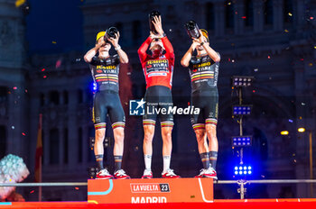 2023-09-17 - Jonas Vingegaard (Jumbo-Visma), Sepp Kuss (Jumbo-Visma) and Primoz Roglic (Jumbo-Visma) at the final awards ceremony of the Spanish cycling race La Vuelta at Plaza de Cibeles on September 16, 2023 in Madrid, Spain - LA VUELTA FINAL AWARDS CEREMONY - SPANISH LA VUELTA - CYCLING