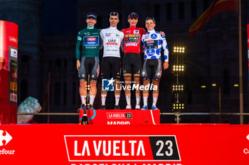 2023-09-17 - Kaden Groves (Alpecin Deceuninck), Juan Ayuso (UAE Emirates Team), Sepp Kuss (Jumbo-Visma) and Remco Evenepoel (Soudal Quick-Step) at the final awards ceremony of the Spanish cycling race La Vuelta at Plaza de Cibeles on September 16, 2023 in Madrid, Spain - LA VUELTA FINAL AWARDS CEREMONY - SPANISH LA VUELTA - CYCLING