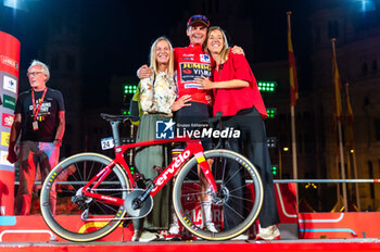 2023-09-17 - Sabina Kuss (mother of Sepp), Sepp Kuss (Jumbo-Visma) and Noemi Ferre (wife of Sepp) at the final awards ceremony of the Spanish cycling race La Vuelta at Plaza de Cibeles on September 16, 2023 in Madrid, Spain - LA VUELTA FINAL AWARDS CEREMONY - SPANISH LA VUELTA - CYCLING