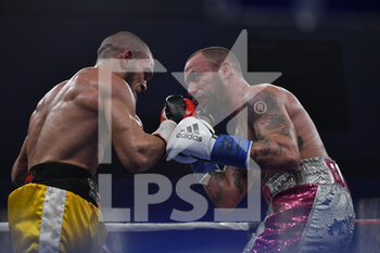 24/02/2023 - Mirko Di Carlantonio (ITA) and Khalil El Harraz (ITA) during he boxing match valid for the European IBF Latino Middleweight Title on Febraury 24, 2023 at PalaTorrino in Rome, Italy - IBF LATIN MIDDLEWEIGHT TITLE - MIRKO DI CARLANTONIO VS KHALIL EL HARRAZ - BOXE - CONTATTO