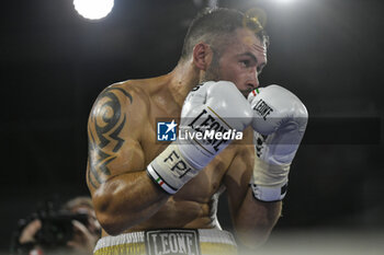2023-10-20 - Dragan Lepei (ITA) during the boxing match with Adriano Sperandio (ITA) valid for Italian Light- heavyweight Championship on October 20, 2023 at PalaSport in Guidonia Rome, Italy - ITALIAN LIGHT HEAVYWEIGHT TITLE - SPERANDIO VS LEPEI - BOXING - CONTACT