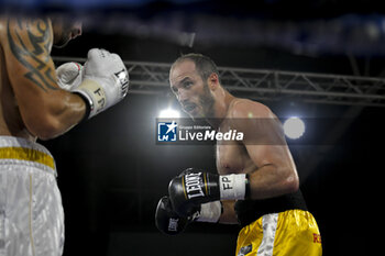2023-10-20 - Adriano Sperandio (ITA) vs Dragan Lepei (ITA) during the boxing match valid for Italian Light- heavyweight Championship on October 20, 2023 at PalaSport in Guidonia Rome, Italy - ITALIAN LIGHT HEAVYWEIGHT TITLE - SPERANDIO VS LEPEI - BOXING - CONTACT