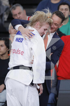 2023-02-05 - Kim Polling (NED) in arms of his trainer after won the Bronze medal against Barbara Matic (CRO) during the International Judo Paris Grand Slam 2023 (IJF) on February 5, 2023 at Accor Arena in Paris, France - JUDO - PARIS GRAND SLAM 2023 - JUDO - CONTACT