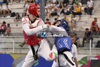 2023-06-09 - Konstantinos CHAMALIDIS (GRE) vs Levente mark JOZSA (HUN) during Semi Finals round Men -68kg of World Taekwondo Grand Prix at Foro Italico, Nicola Pietrangeli Stadium, 9th June 2023, Rome, Italy. - WORLD TAEKWONDO GRAND PRIX DAY1 - TAEKWONDO - CONTACT