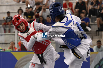 2023-06-09 - Yu-jin KIM (KOR) vs Nahid KIYANICHANDEH (IRI) during Semi Finals round Women -57kg of World Taekwondo Grand Prix at Foro Italico, Nicola Pietrangeli Stadium, 9th June 2023, Rome, Italy. - WORLD TAEKWONDO GRAND PRIX DAY1 - TAEKWONDO - CONTACT