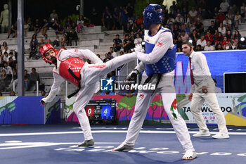 2023-06-11 - Saleh ELSHARABATY (JOR) vs Mehran BARKHORDARI (IRI) during Finals round Men -80kg of World Taekwondo Grand Prix at Foro Italico, Nicola Pietrangeli Stadium, 11th June 2023, Rome, Italy. - WORLD TAEKWONDO GRAND PRIX ROME (DAY3) - TAEKWONDO - CONTACT