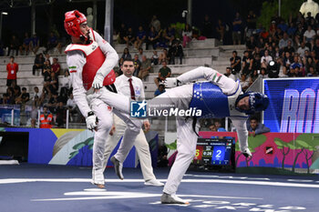 2023-06-11 - Saleh ELSHARABATY (JOR) vs Mehran BARKHORDARI (IRI) during Finals round Men -80kg of World Taekwondo Grand Prix at Foro Italico, Nicola Pietrangeli Stadium, 11th June 2023, Rome, Italy. - WORLD TAEKWONDO GRAND PRIX ROME (DAY3) - TAEKWONDO - CONTACT