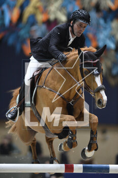 2023-03-18 - Marc Dilasser (FRA) riding E2k Abricot Ennemmelle during the Saut Hermès 2023, equestrian FEI event on March 18, 2023 at the ephemeral Grand-palais in Paris, France - EQUESTRIAN - THE SAUT HERMES 2023 - INTERNATIONALS - EQUESTRIAN
