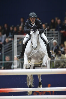 2023-03-18 - Gregory Cottard (FRA) riding Cocaine du Val during the Saut Hermès 2023, equestrian FEI event on March 18, 2023 at the ephemeral Grand-palais in Paris, France - EQUESTRIAN - THE SAUT HERMES 2023 - INTERNATIONALS - EQUESTRIAN