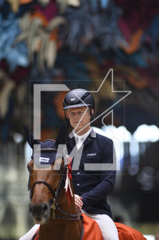 2023-03-18 - Max Kuhner (FRA) riding EIC Coriolis Des Isles during the Saut Hermès 2023, equestrian FEI event on March 18, 2023 at the ephemeral Grand-palais in Paris, France - EQUESTRIAN - THE SAUT HERMES 2023 - INTERNATIONALS - EQUESTRIAN