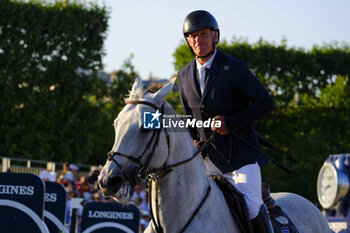 2023-06-24 - Roger Yves Bost riding Cassius Clay VDV Z during the Longines Paris Eiffel Jumping 2023, Longines Global Champions Tour, Equestrian event on June 24, 2023 at Champ de Mars in Paris, France - EQUESTRIAN - PARIS EIFFEL JUMPING 2023 - INTERNATIONALS - EQUESTRIAN