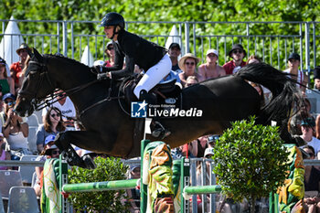 2023-06-24 - Natalie DEAN of United States riding Nespresso van't Laekhof during the Longines Paris Eiffel Jumping 2023, Longines Global Champions Tour, Equestrian event on June 24, 2023 at Champ de Mars in Paris, France - EQUESTRIAN - PARIS EIFFEL JUMPING 2023 - INTERNATIONALS - EQUESTRIAN