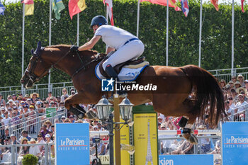 2023-06-25 - Christian Ahlmann riding OTTERONGO ALPHA Z during the Longines Paris Eiffel Jumping 2023, Longines Global Champions Tour, Equestrian event on June 25, 2023 at Champ de Mars in Paris, France - EQUESTRIAN - PARIS EIFFEL JUMPING 2023 - INTERNATIONALS - EQUESTRIAN