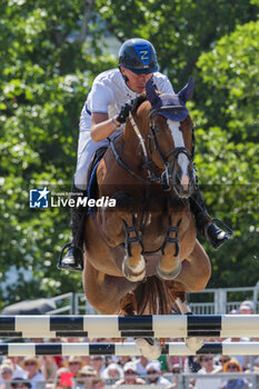 2023-06-25 - Christian Ahlmann riding OTTERONGO ALPHA Z during the Longines Paris Eiffel Jumping 2023, Longines Global Champions Tour, Equestrian event on June 25, 2023 at Champ de Mars in Paris, France - EQUESTRIAN - PARIS EIFFEL JUMPING 2023 - INTERNATIONALS - EQUESTRIAN