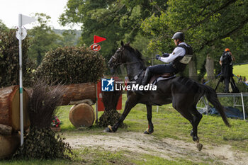2023-08-12 - Jerome ROBINE (GER) BLACK ICE competes during the cross-country event and took the 10 th rank at this event, at the FEI Eventing European Championship 2023, Equestrian CH-EU-CCI4-L event on August 12, 2023 at Haras du Pin in Le Pin-au-Haras, France - EQUESTRIAN - FEI EVENTING EUROPEAN CHAMPIONSHIP 2023 - INTERNATIONALS - EQUESTRIAN
