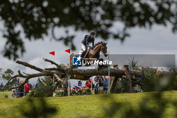 2023-08-12 - Gireg LE COZ (FRA) AISPRIT DE LA LOGE competes during the cross-country event and took the 12 th rank at this event, at the FEI Eventing European Championship 2023, Equestrian CH-EU-CCI4-L event on August 12, 2023 at Haras du Pin in Le Pin-au-Haras, France - EQUESTRIAN - FEI EVENTING EUROPEAN CHAMPIONSHIP 2023 - INTERNATIONALS - EQUESTRIAN