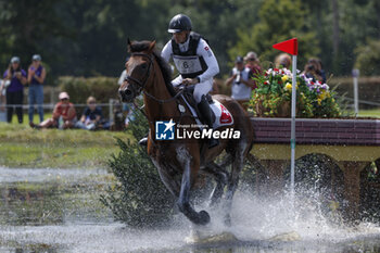 2023-08-12 - Robin GODEL (SUI) GRANDEUR DE LULLY CH competes during the cross-country event and took the 24 th rank at this event, at the FEI Eventing European Championship 2023, Equestrian CH-EU-CCI4-L event on August 12, 2023 at Haras du Pin in Le Pin-au-Haras, France - EQUESTRIAN - FEI EVENTING EUROPEAN CHAMPIONSHIP 2023 - INTERNATIONALS - EQUESTRIAN