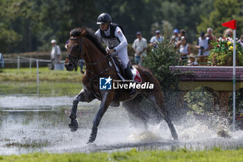 2023-08-12 - Robin GODEL (SUI) GRANDEUR DE LULLY CH competes during the cross-country event and took the 24 th rank at this event, at the FEI Eventing European Championship 2023, Equestrian CH-EU-CCI4-L event on August 12, 2023 at Haras du Pin in Le Pin-au-Haras, France - EQUESTRIAN - FEI EVENTING EUROPEAN CHAMPIONSHIP 2023 - INTERNATIONALS - EQUESTRIAN
