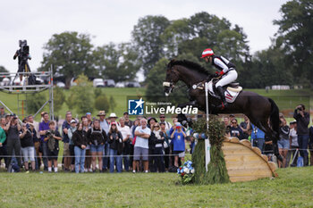 2023-08-12 - Lea SIEGL (AUT) VAN HELSING P competes during the cross-country event and gave up at fence 27B this event, at the FEI Eventing European Championship 2023, Equestrian CH-EU-CCI4-L event on August 12, 2023 at Haras du Pin in Le Pin-au-Haras, France - EQUESTRIAN - FEI EVENTING EUROPEAN CHAMPIONSHIP 2023 - INTERNATIONALS - EQUESTRIAN
