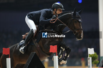 2023-11-12 - Max Kuhner (AUT) riding EIC Julius Caesar in action during the CSI5* - W Longines FEI World Cup Competition presented by Scuderia 1918 - Verona Jumping at 125th edition of Fieracavalli on November 12, 2023, Verona, Italy. - CSI5* - W LONGINES FEI WORLD CUP COMPETITION - VERONA JUMPING - INTERNATIONALS - EQUESTRIAN