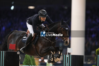 2023-11-12 - Max Kuhner (AUT) riding EIC Julius Caesar in action during the CSI5* - W Longines FEI World Cup Competition presented by Scuderia 1918 - Verona Jumping at 125th edition of Fieracavalli on November 12, 2023, Verona, Italy. - CSI5* - W LONGINES FEI WORLD CUP COMPETITION - VERONA JUMPING - INTERNATIONALS - EQUESTRIAN