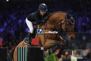 2023-11-12 - Edwina Tops-Alexander (AUS) riding Corelli de Mies in action during the CSI5* - W Longines FEI World Cup Competition presented by Scuderia 1918 - Verona Jumping at 125th edition of Fieracavalli on November 12, 2023, Verona, Italy. - CSI5* - W LONGINES FEI WORLD CUP COMPETITION - VERONA JUMPING - INTERNATIONALS - EQUESTRIAN