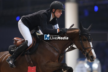 12/11/2023 - Henrik Von Eckermann (SWE) riding Iliana in action during the CSI5* - W Longines FEI World Cup Competition presented by Scuderia 1918 - Verona Jumping at 125th edition of Fieracavalli on November 12, 2023, Verona, Italy. - CSI5* - W LONGINES FEI WORLD CUP COMPETITION - VERONA JUMPING - INTERNAZIONALI - EQUITAZIONE