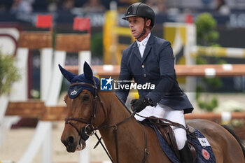 11/11/2023 - Ben Maher (BGR) riding Enjoy de Grisien in action during the CSI5* - International Competition N°5 presented by Crivelli - Verona Jumping at 125th Fieracavalli on November 11, 2023, Verona, Italy. - CSI5* - INTERNATIONAL COMPETITION N°5 - VERONA JUMPING - INTERNAZIONALI - EQUITAZIONE