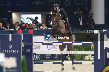 11/11/2023 - Emanuele Gaudiano (ITA) riding Nikolaj de Music in action during the CSI5* - International Competition N°5 presented by Crivelli - Verona Jumping at 125th Fieracavalli on November 11, 2023, Verona, Italy. - CSI5* - INTERNATIONAL COMPETITION N°5 - VERONA JUMPING - INTERNAZIONALI - EQUITAZIONE