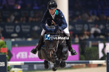 11/11/2023 - Denis Lynch (IRL) riding Dark Chocolate 48 in action during the CSI5* - International Competition N°5 presented by Crivelli - Verona Jumping at 125th Fieracavalli on November 11, 2023, Verona, Italy. - CSI5* - INTERNATIONAL COMPETITION N°5 - VERONA JUMPING - INTERNAZIONALI - EQUITAZIONE