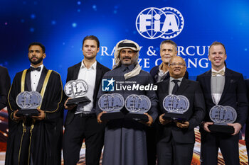 2023-12-09 - AL-FERAIHI Khaled, FIA Middle-East Cup for Cross-Country Bajas for Drivers, portrait with MIKKELSEN Andreas, FIA WRC2 Championship for Drivers and AL-ATTIYAH Nasser, FIA Middle-East Rally Championship for Drivers during the 2023 FIA Rally & Circuit Prize Giving Ceremony in Baky on December 9, 2023 at Baku Convention Center in Baku, Azerbaijan - FIA RALLY CIRCUIT PRIZE GIVING 2023 - BAKU - OTHER - MOTORS