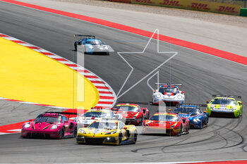 2023-04-16 - 33 KEATING Ben (usa), VARRONE Nicolas (arg), CATSBURG Nicky (nld), Corvette Racing, Chevrolet Corvette C8.R, action, 85 BOVY Sarah (bel), GATTING Michelle (dnk), FREY Rahel (swi), Iron Dames, Porsche 911 RSR - 19, action, start of the race, depart, during the 6 Hours of Portimao 2023, 2nd round of the 2023 FIA World Endurance Championship, from April 14 to 16, 2023 on the Algarve International Circuit in Portimao, Portugal - AUTO - FIA WEC - 6 HOURS OF PORTIMAO 2023 - ENDURANCE - MOTORS