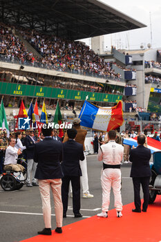2023-06-10 - LeBron James receiving the starting flag during the 24 Hours of Le Mans 2023 on the Circuit des 24 Heures du Mans from June 10 to 11, 2023 in Le Mans, France - AUTO - LE MANS 2023 - PART 1 - ENDURANCE - MOTORS