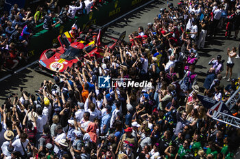 2023-06-11 - 51 PIER GUIDI Alessandro (ita), CALADO James (gbr), GIOVINAZZI Antonio (ita), Ferrari AF Corse, Ferrari 499P, vainqueurs, winners during the podium of the 24 Hours of Le Mans 2023 on the Circuit des 24 Heures du Mans on June 11, 2023 in Le Mans, France - AUTO - LE MANS 2023 - PODIUM - ENDURANCE - MOTORS