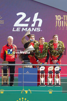 2023-06-11 - 51 PIER GUIDI Alessandro (ita), CALADO James (gbr), GIOVINAZZI Antonio (ita), Ferrari AF Corse, Ferrari 499P, celebrating victory during the podium of the 24 Hours of Le Mans 2023 on the Circuit des 24 Heures du Mans on June 11, 2023 in Le Mans, France - AUTO - LE MANS 2023 - PODIUM - ENDURANCE - MOTORS