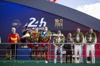 2023-06-11 - 51 PIER GUIDI Alessandro (ita), CALADO James (gbr), GIOVINAZZI Antonio (ita), Ferrari AF Corse, Ferrari 499P, win celebration, 02 BAMBER Earl (nzl), LYNN Alex (gbr), WESTBROOK Richard (gbr), Cadillac Racing, Cadillac V-Series.R during the podium of the 24 Hours of Le Mans 2023 on the Circuit des 24 Heures du Mans on June 11, 2023 in Le Mans, France - AUTO - LE MANS 2023 - PODIUM - ENDURANCE - MOTORS