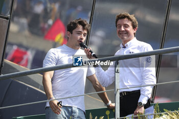 2023-06-11 - LECLERC, Charles F1 Driver, during the podium of the 24 Hours of Le Mans 2023 on the Circuit des 24 Heures du Mans on June 11, 2023 in Le Mans, France - AUTO - LE MANS 2023 - PODIUM - ENDURANCE - MOTORS